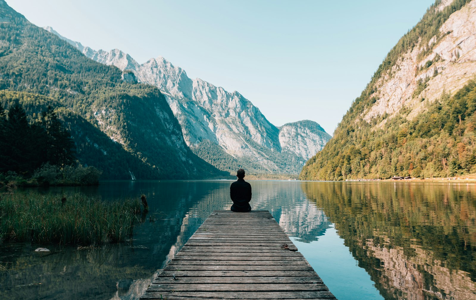 A tranquil wellness deck overlooking calm water